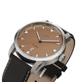 RAM Aries 42 Swiss men's watch with 42mm stainless steel case, brown dial, black leather strap, and date display at 6 o'clock